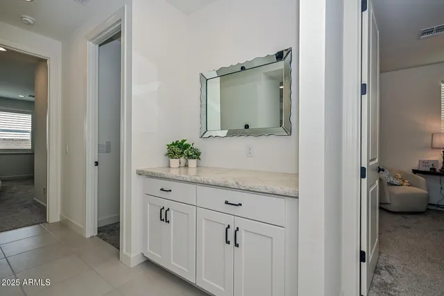 a view of a house with patio and garden