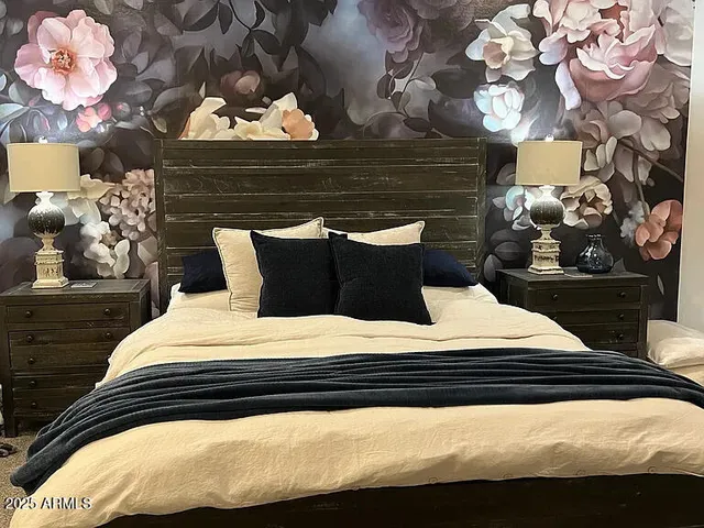 a view of a yard with lawn chairs