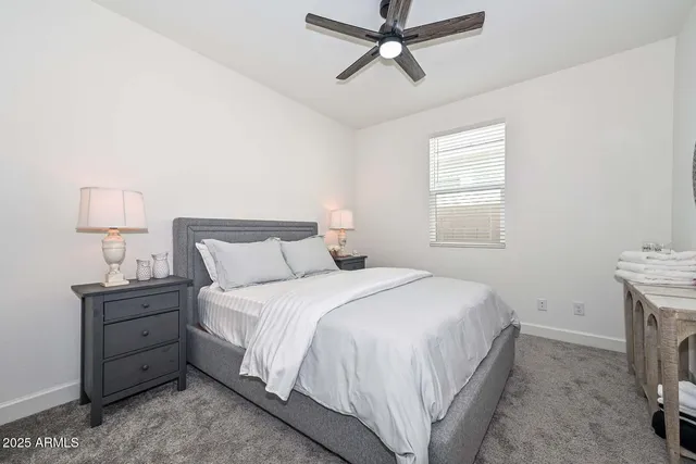 a dining room with wooden floor a glass table and chairs