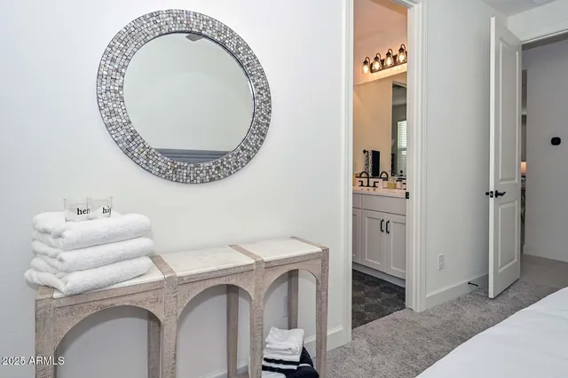 a view of a patio with a table and chairs