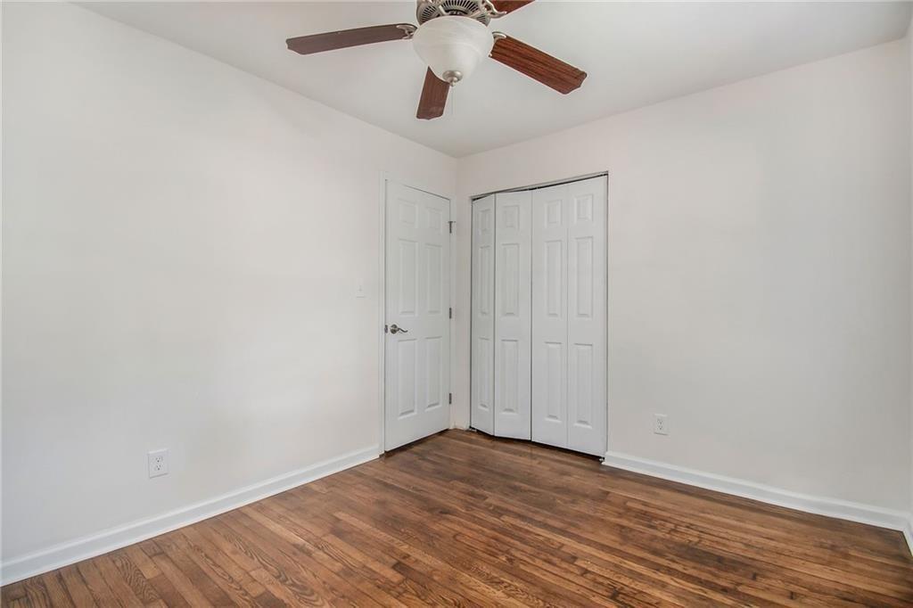 980 Fairburn Road Northwest Atlanta, GA 30331 - Photo 5 of 8 a view of empty room with wooden floor