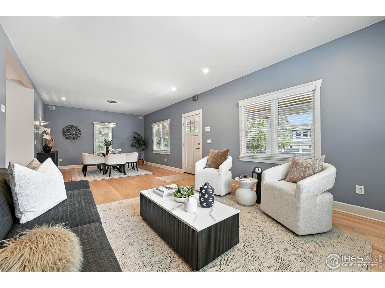 3561 4th Street Boulder, CO 80304 - Photo 12 of 50 a living room with furniture and a large window