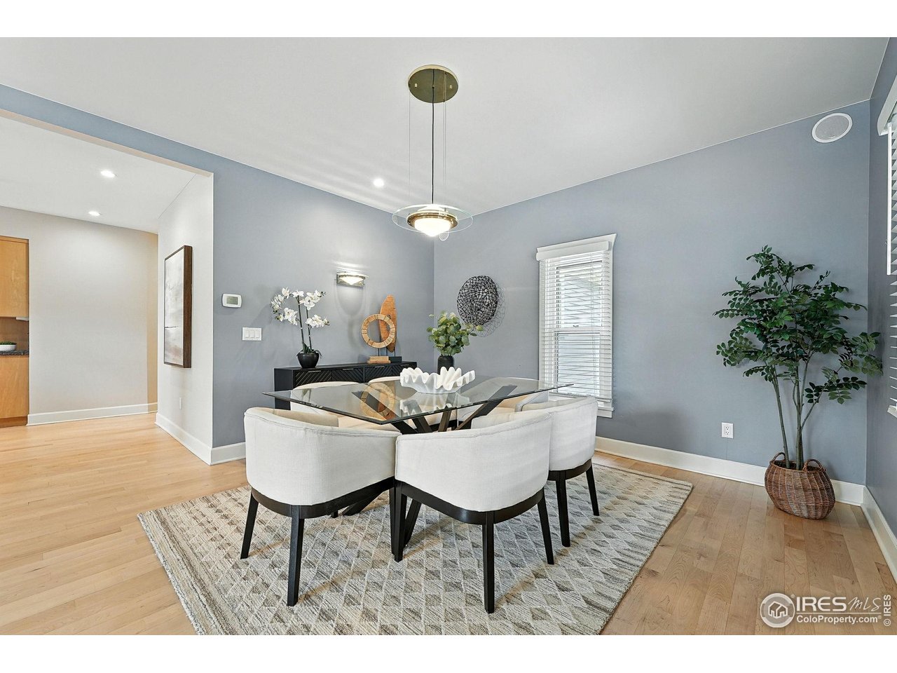 3561 4th Street Boulder, CO 80304 - Photo 14 of 50 a view of a dining room with furniture and a potted plant
