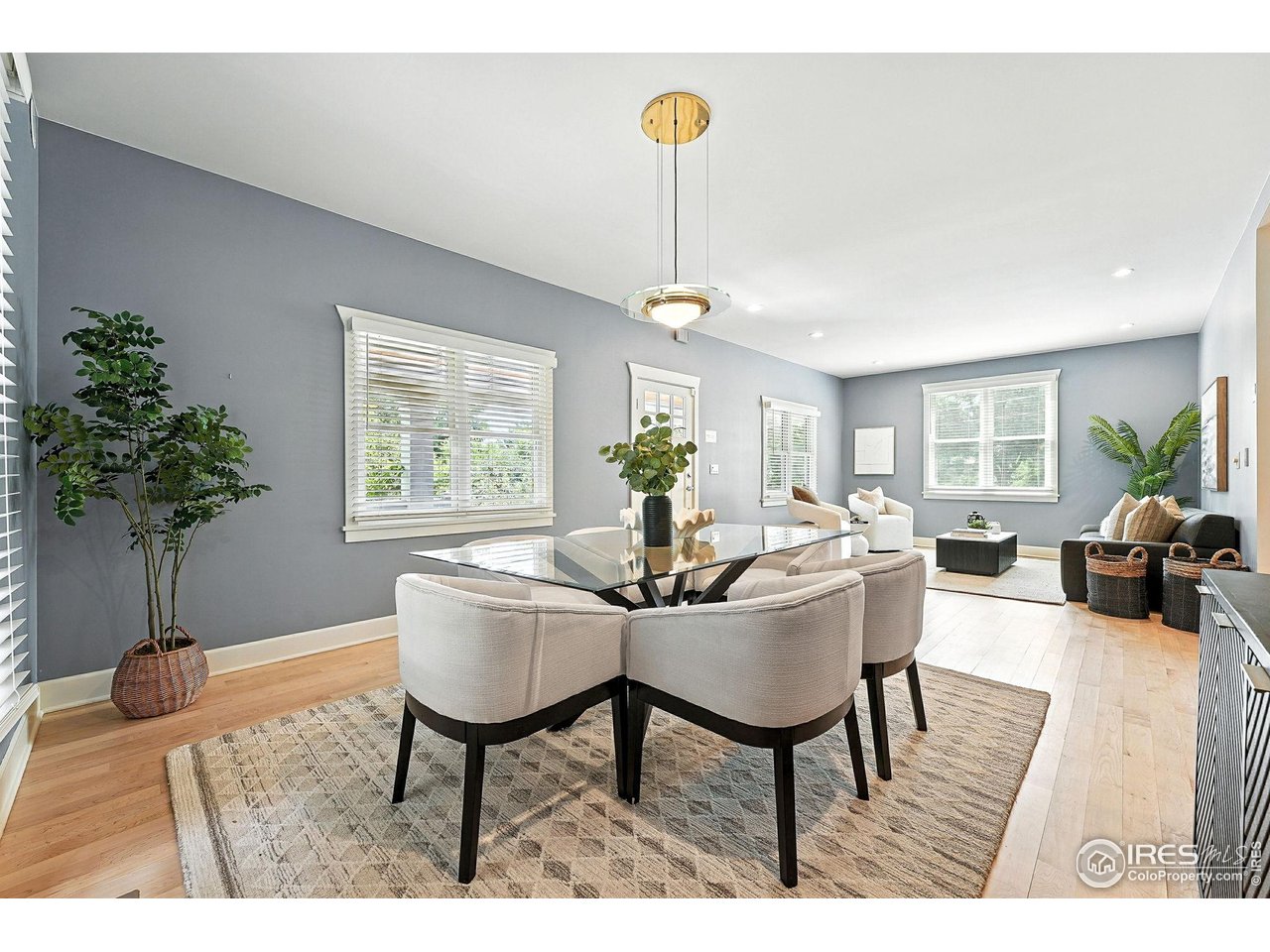 3561 4th Street Boulder, CO 80304 - Photo 16 of 50 a view of a dining room with furniture window and wooden floor