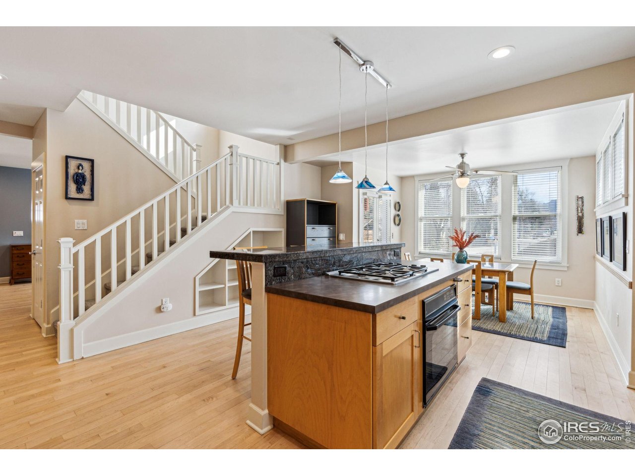 3561 4th Street Boulder, CO 80304 - Photo 18 of 50 a kitchen with stainless steel appliances granite countertop a stove and a view of living room