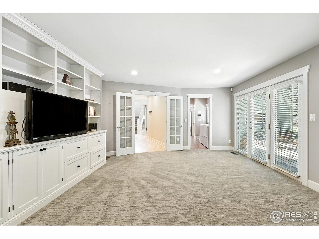 3561 4th Street Boulder, CO 80304 - Photo 23 of 50 a view of a livingroom with furniture flat screen tv and windows