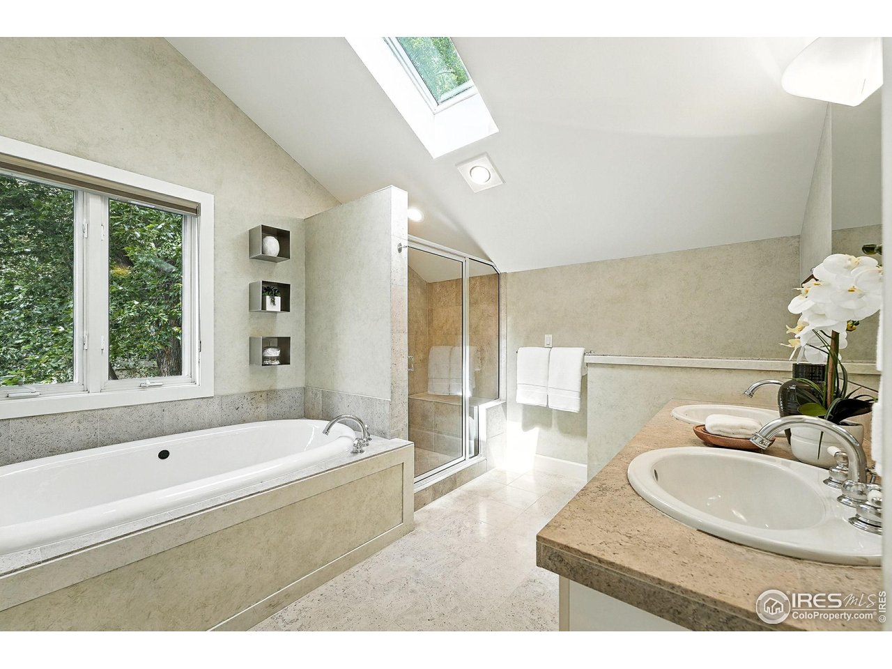 3561 4th Street Boulder, CO 80304 - Photo 34 of 50 a bathroom with a tub sink and mirror