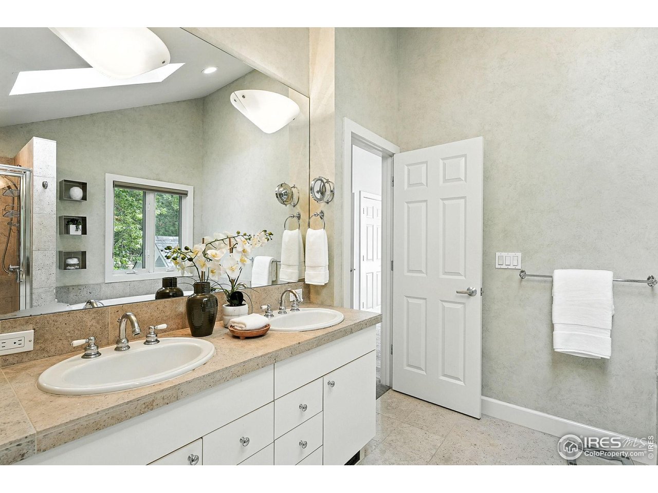 3561 4th Street Boulder, CO 80304 - Photo 35 of 50 a bathroom with a double vanity sink mirror and double