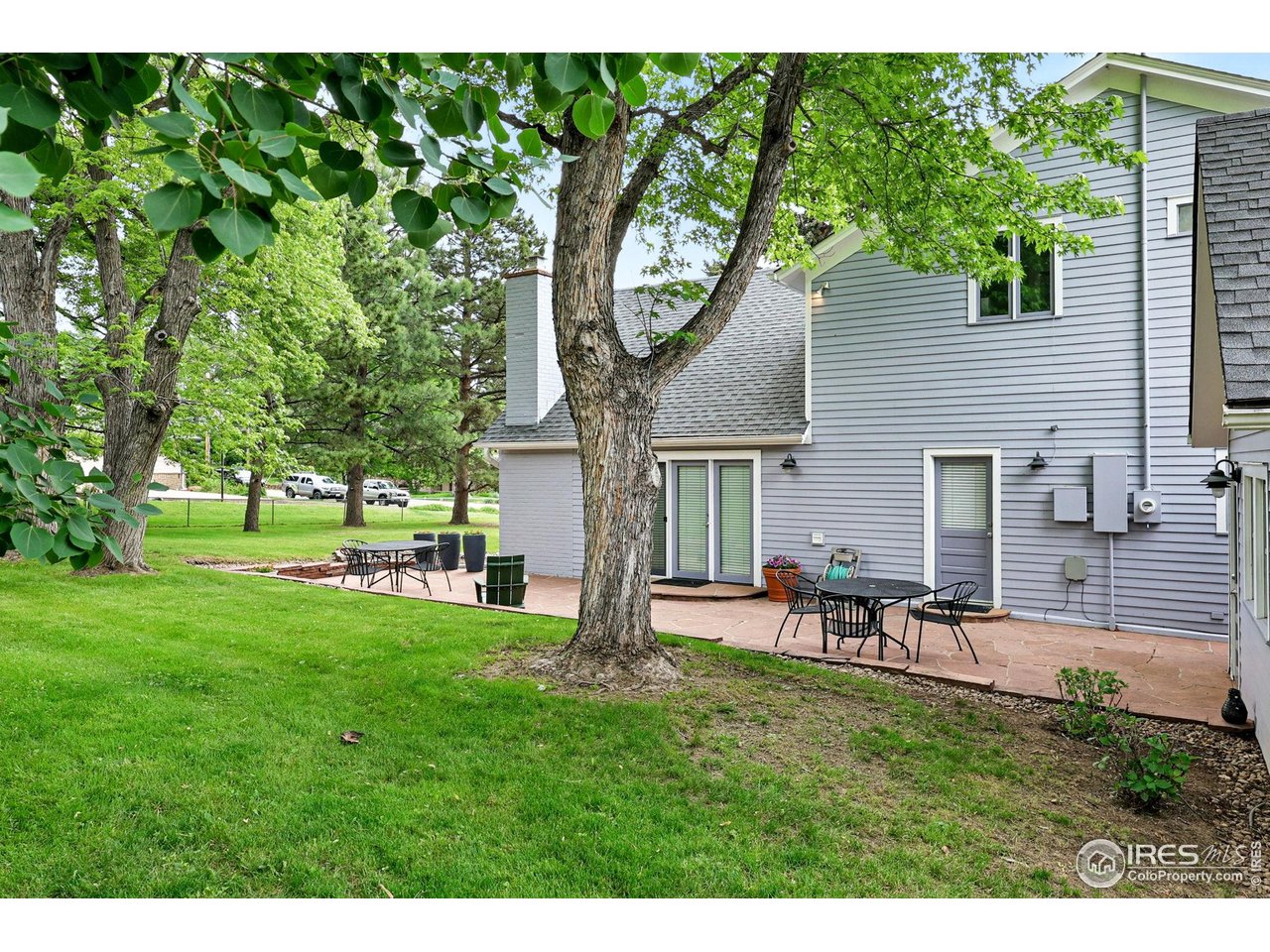 3561 4th Street Boulder, CO 80304 - Photo 45 of 50 a view of a chair and table in the garden