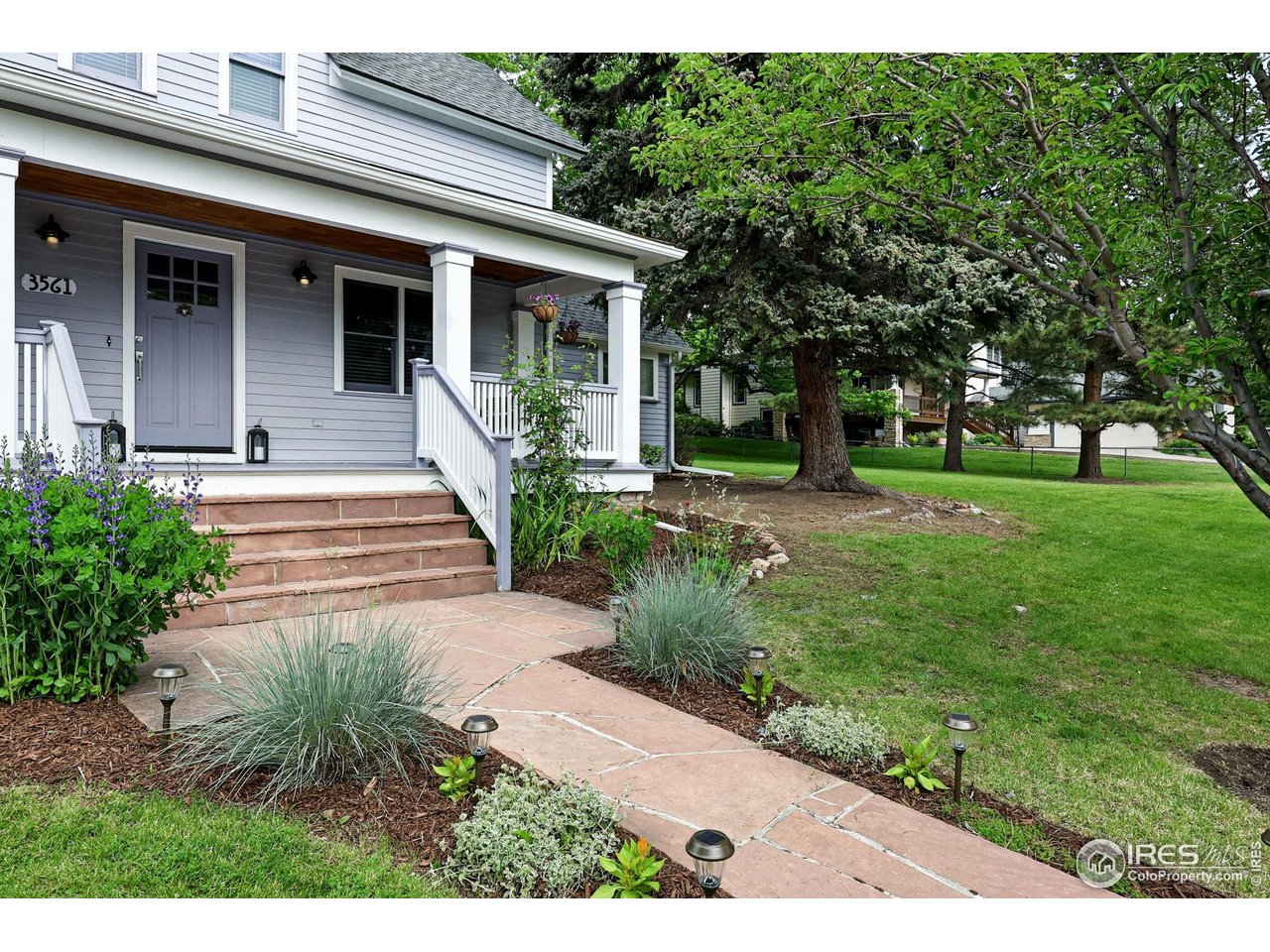 3561 4th Street Boulder, CO 80304 - Photo 6 of 50 a view of a house with a yard