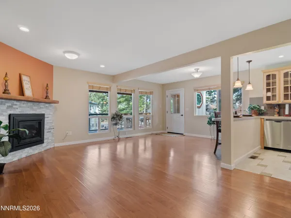 a kitchen with a refrigerator and a stove