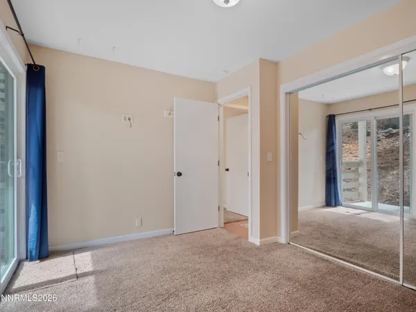 a view of a room with a large window