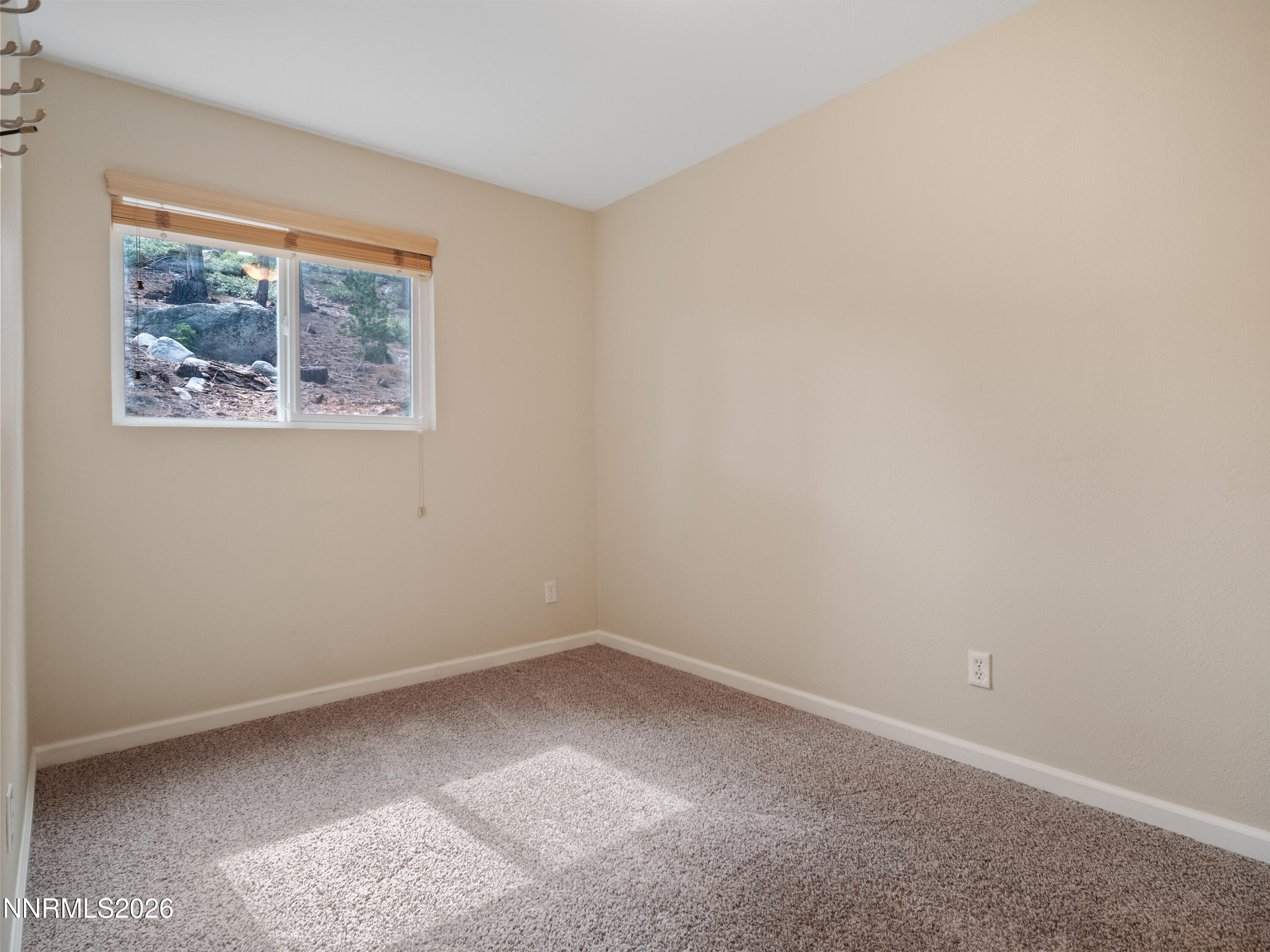 761 Milky Way Court, Unit A Stateline, NV 89449 - Photo 31 of 43 an empty room with a window