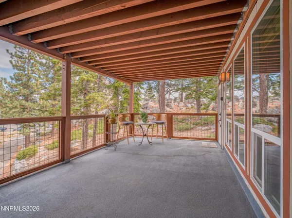 a lobby with furniture and potted plant