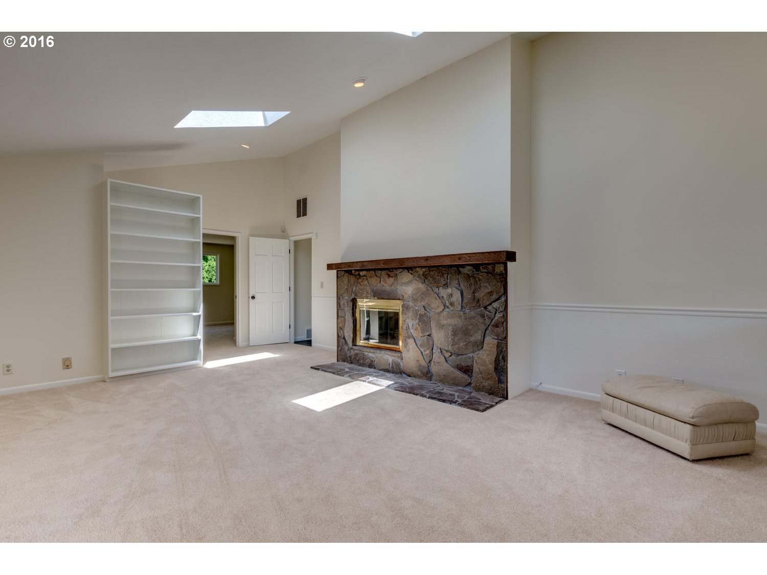 8473 South Heinz Road Canby, OR 97013 - Photo 5 of 32 a view of an empty room with a fireplace