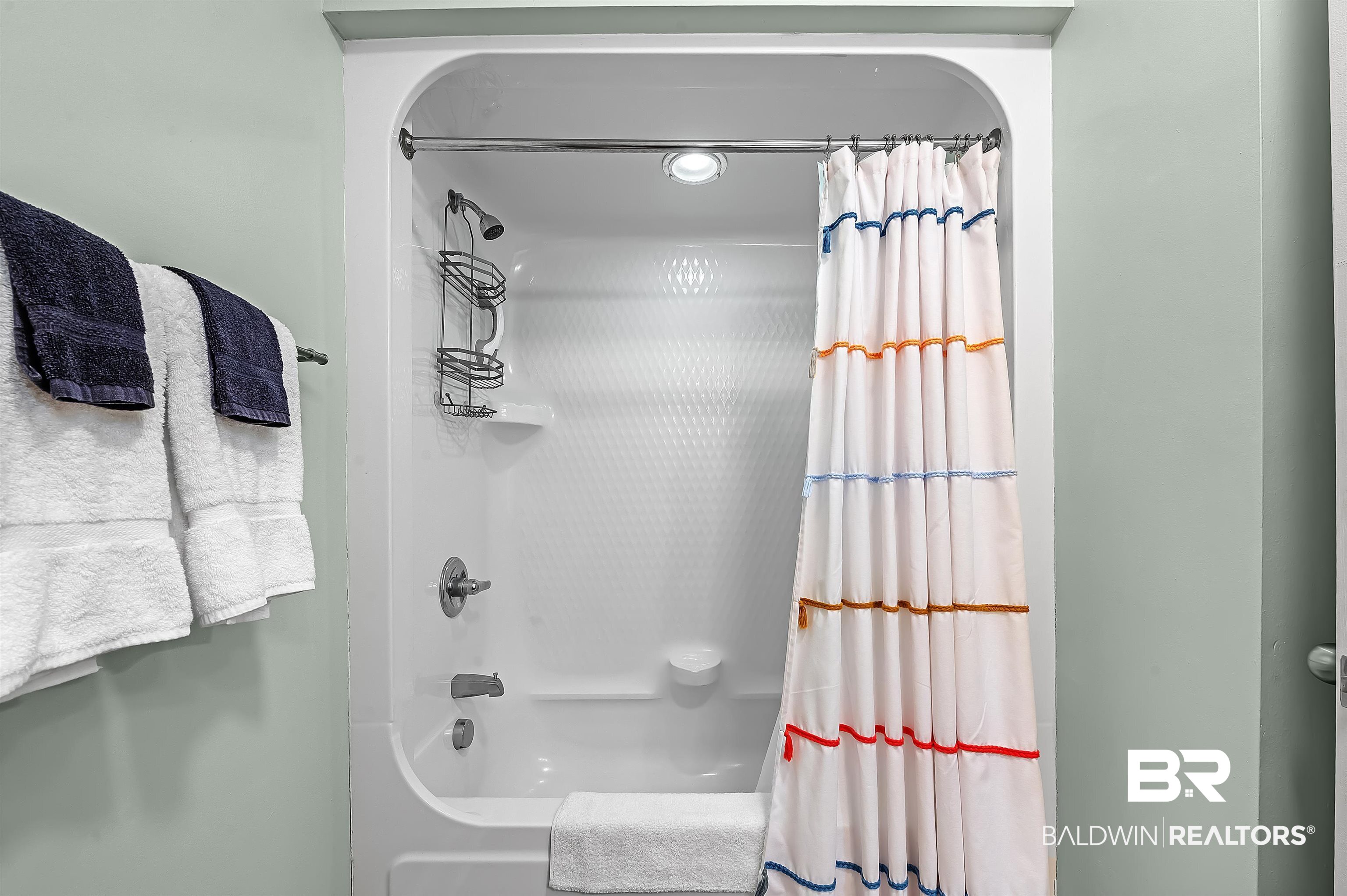 27582 Canal Road, Unit 2104 Orange Beach, AL 36561 - Photo 31 of 35 Bathroom featuring shower / bathtub combination with curtain