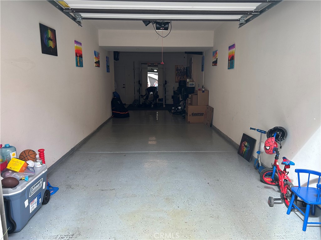 400 West Central Avenue, Unit 304 Brea, CA 92821 - Photo 13 of 17 an entryway and livingroom with toys
