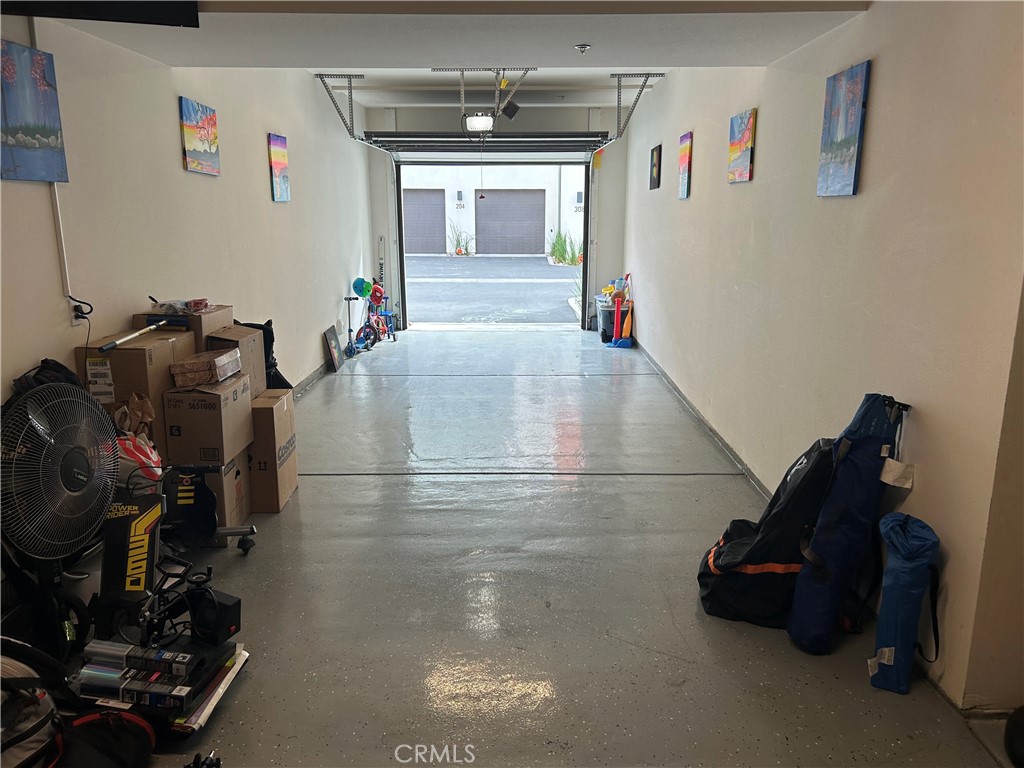 400 West Central Avenue, Unit 304 Brea, CA 92821 - Photo 15 of 17 a hallway with a view of living room