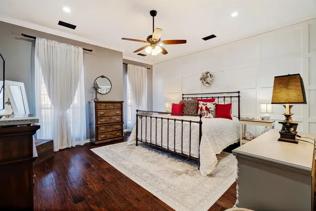 a bedroom with furniture and a window