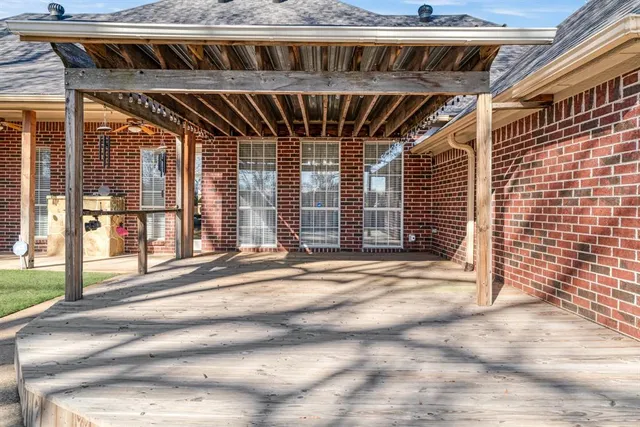 a view of a back yard on the house
