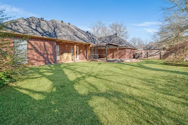 a big room with lots of trees and plants