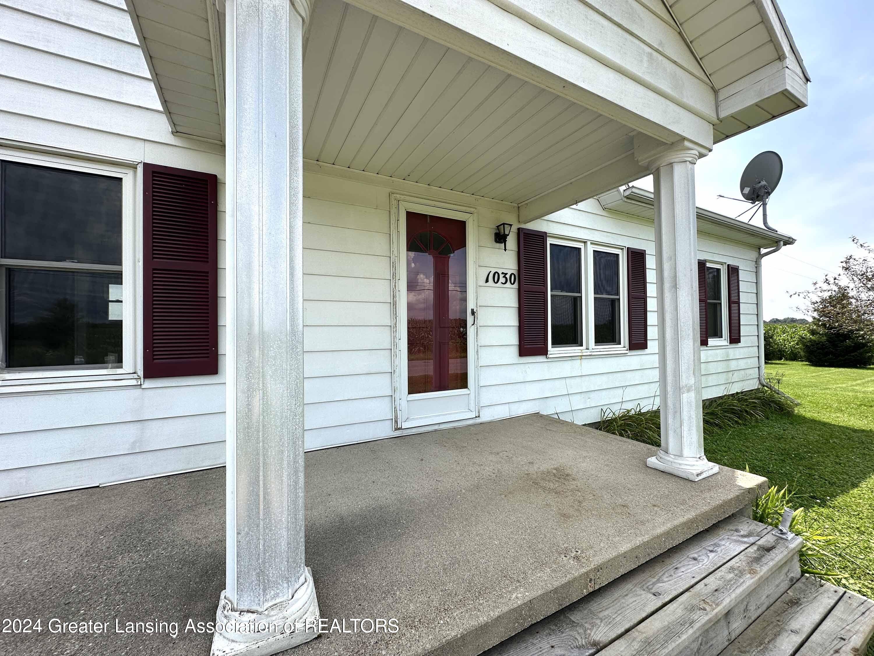 1030 Noble Road Williamston, MI 48895 - Photo 5 of 23 1030 Noble Rd. Covered Front Porch