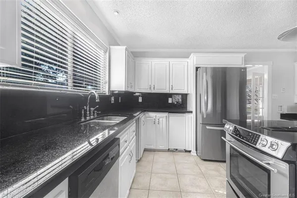 $448,000 | 5027 Fernwood Drive, Lake Charles, LA 70605