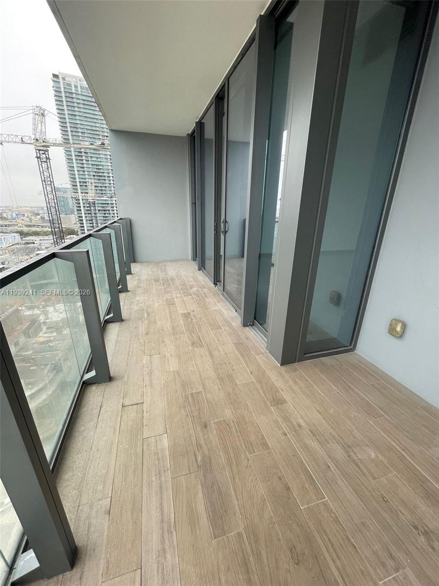 88 Southwest 7th Street, Unit 1608 Miami, FL 33130 - Photo 11 of 14 a view of balcony with furniture