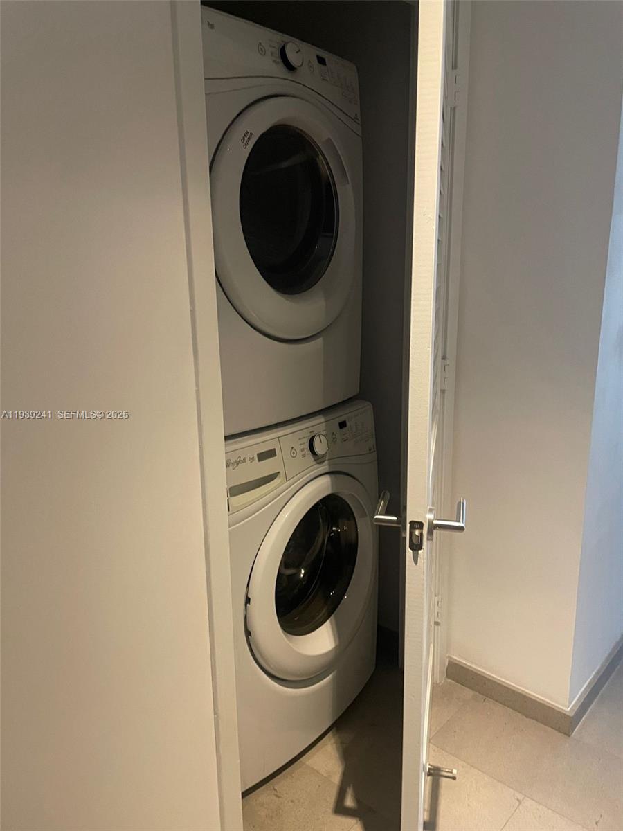 88 Southwest 7th Street, Unit 1608 Miami, FL 33130 - Photo 5 of 14 a close up view of a washer and dryer