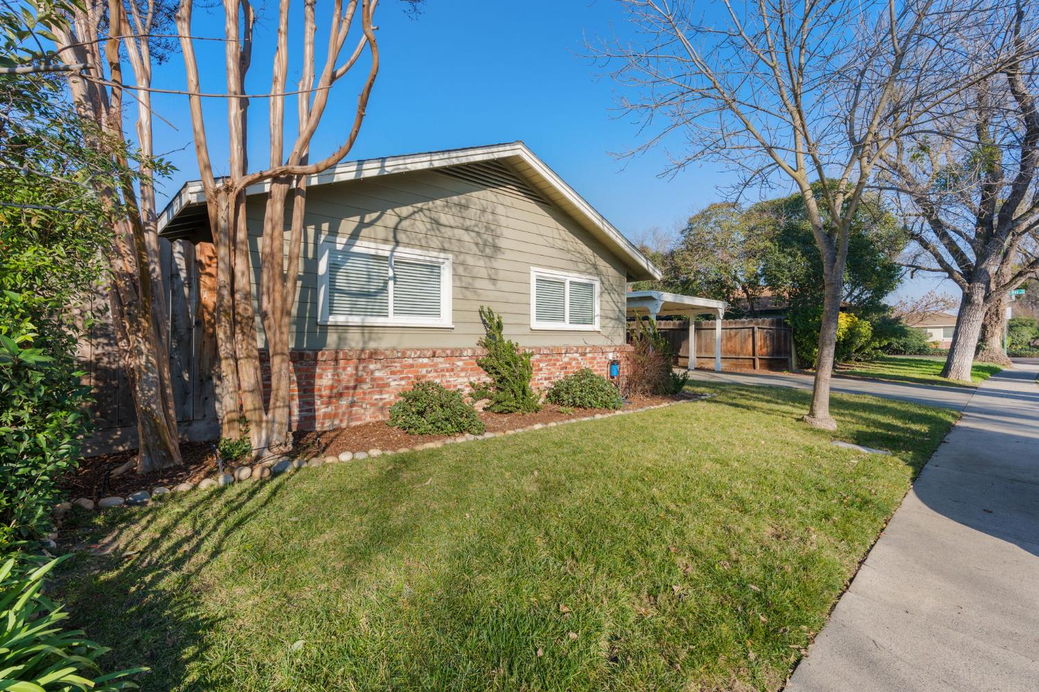 1405 Fordham Avenue Modesto, CA 95350 - Photo 1 of 32 a view of a house with a yard