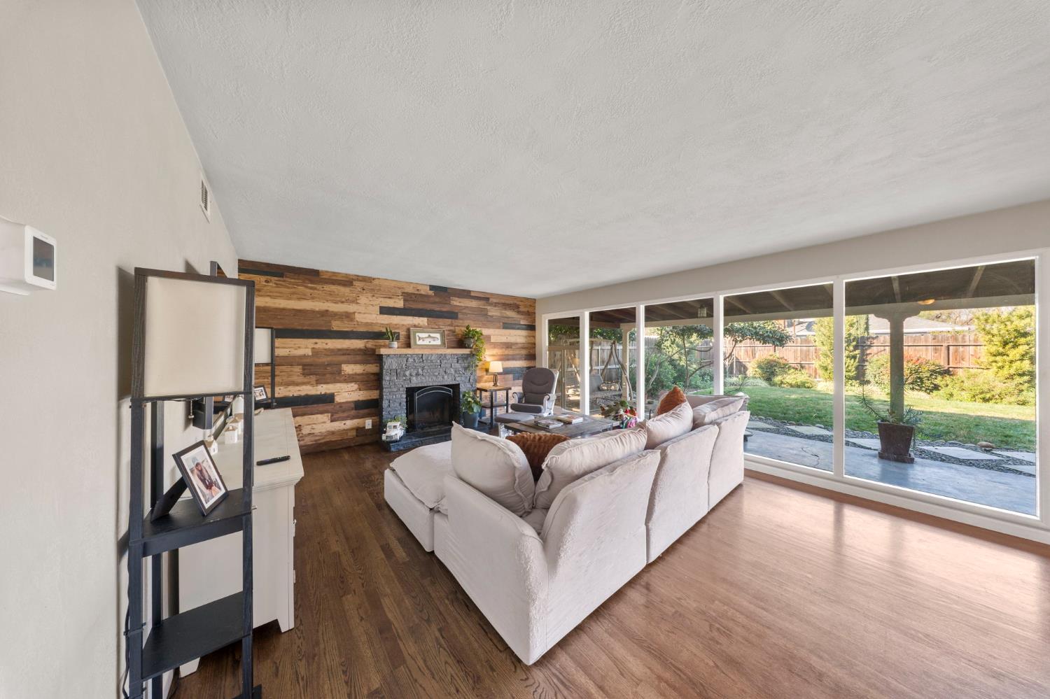 1405 Fordham Avenue Modesto, CA 95350 - Photo 7 of 32 a living room with furniture and a large window