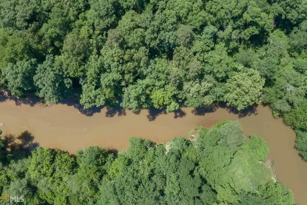 a view of a lake from a yard