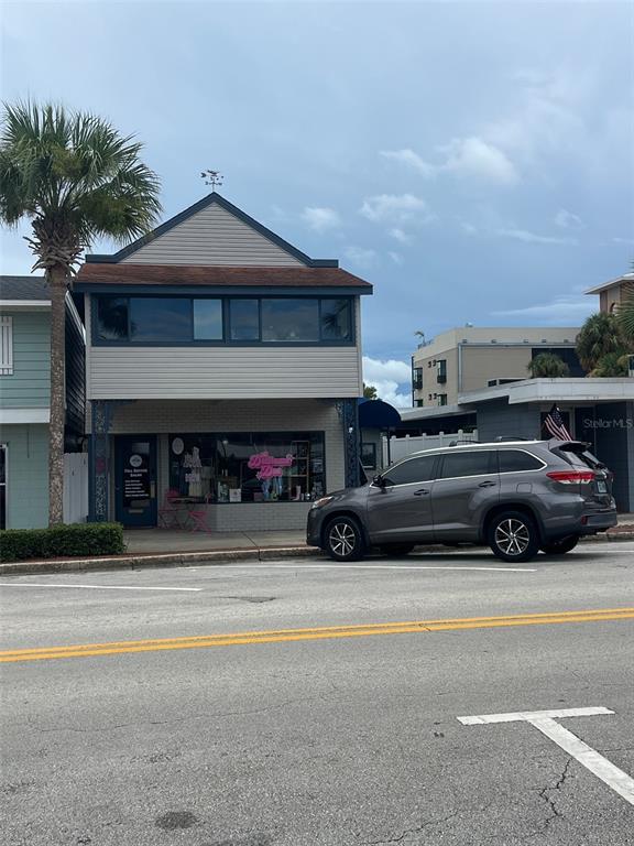 107 West Main Street Tavares, FL 32778 - Photo 2 of 10 a view of a car park in front of house
