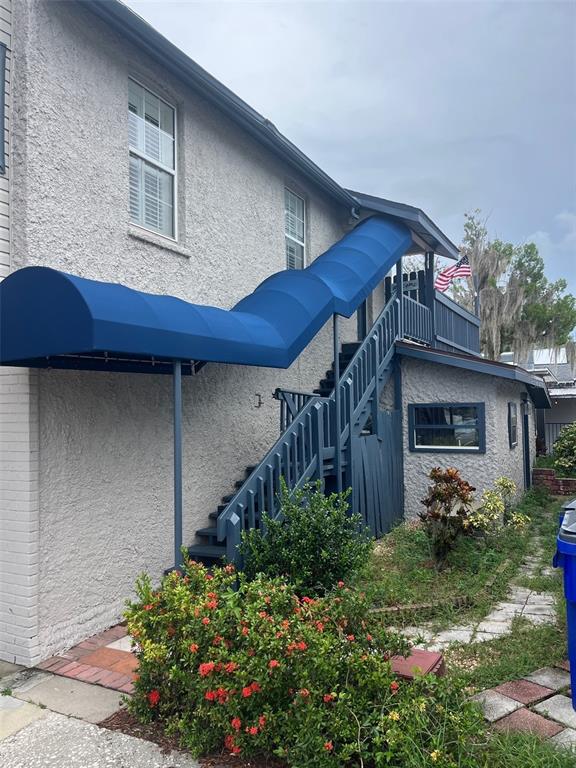 107 West Main Street Tavares, FL 32778 - Photo 5 of 10 a house view with a backyard space