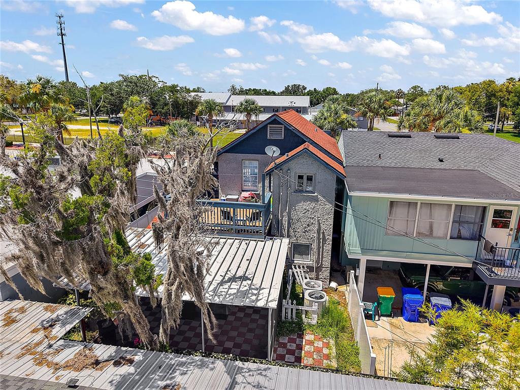 107 West Main Street Tavares, FL 32778 - Photo 6 of 10 a view of a chairs and table in the terrace
