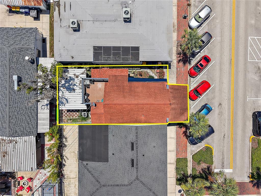 107 West Main Street Tavares, FL 32778 - Photo 7 of 10 an aerial view of residential houses and outdoor space