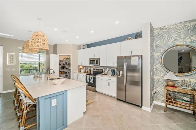 a bathroom with a double vanity sink and mirror