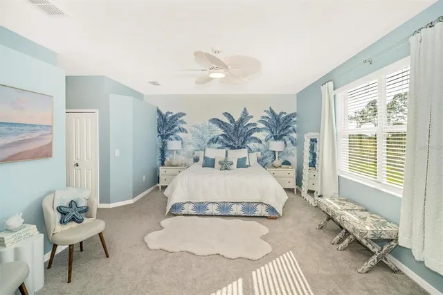 a outdoor living space with furniture and a large window