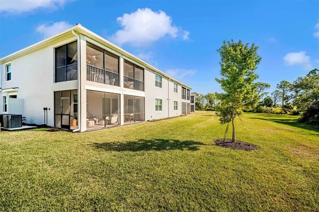 a view of a park with large trees
