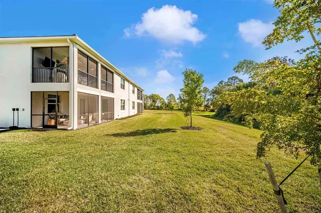 a view of a golf course with an ocean