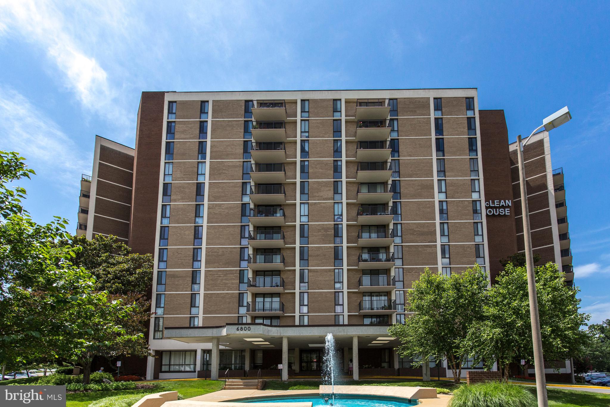 6800 Fleetwood Road, Unit 1013 McLean, VA 22101 - Photo 31 of 32 a front view of a building with a garden