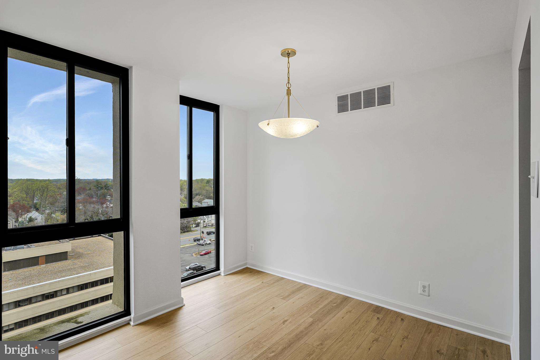 6800 Fleetwood Road, Unit 1013 McLean, VA 22101 - Photo 6 of 32 a view of an empty room with a window