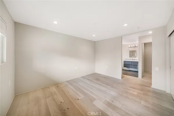 a bathroom with a sink toilet and mirror