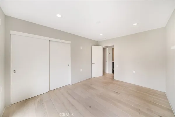 a bathroom with a shower and a toilet