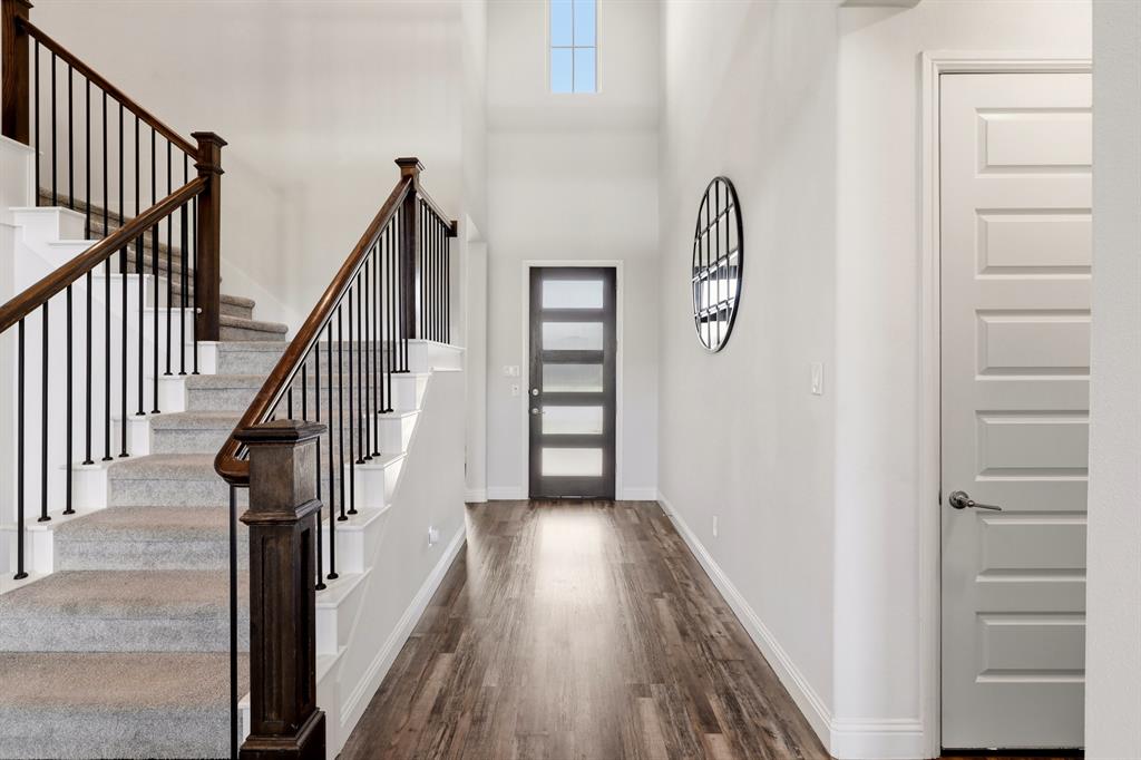 1313 Kirkwood Road Rockwall, TX 75087 - Photo 7 of 39 Elegant entry and staircase.