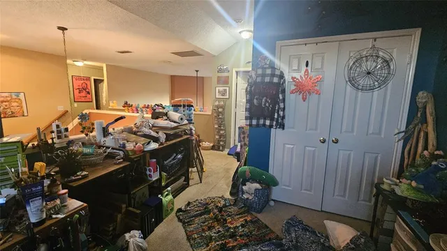 a bed room with a bed and a couch