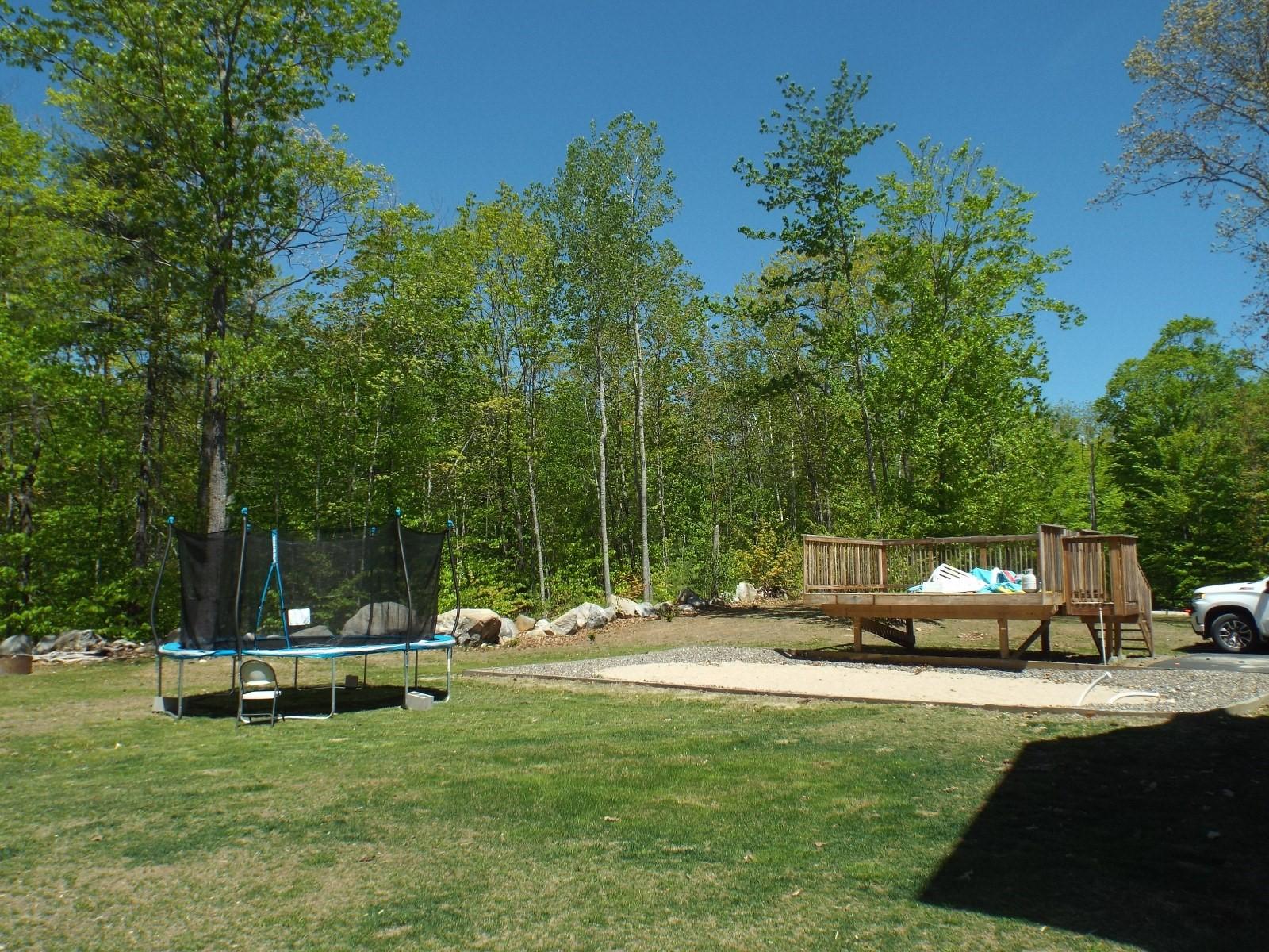 3 Escott Way Naples, ME 04055 - Photo 8 of 41 5 back yard and pool area