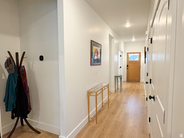 412 West 3025th Street South Logan, UT 84321 - Photo 21 of 34 Corridor featuring light wood-style floors