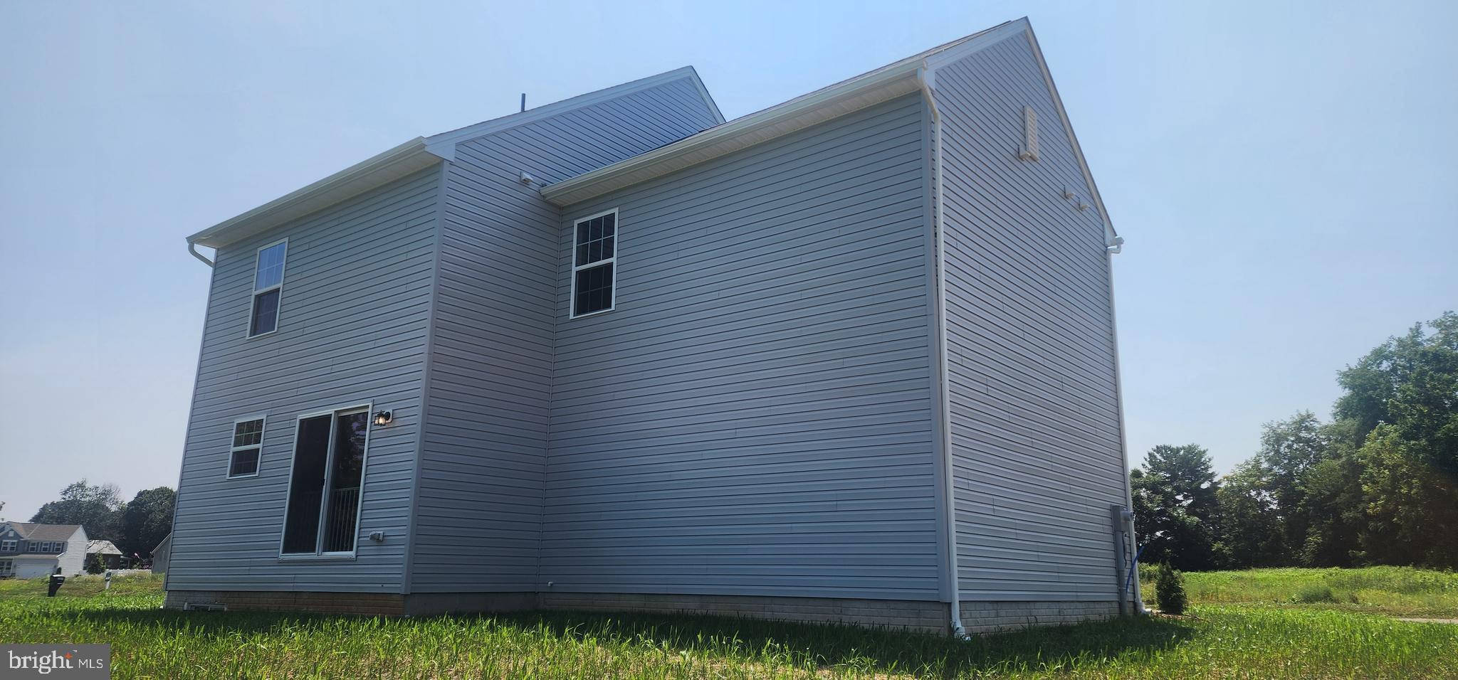 5385 Harrier Way Waynesboro, PA 17268 - Photo 3 of 23 a view of backyard of house with wooden fence