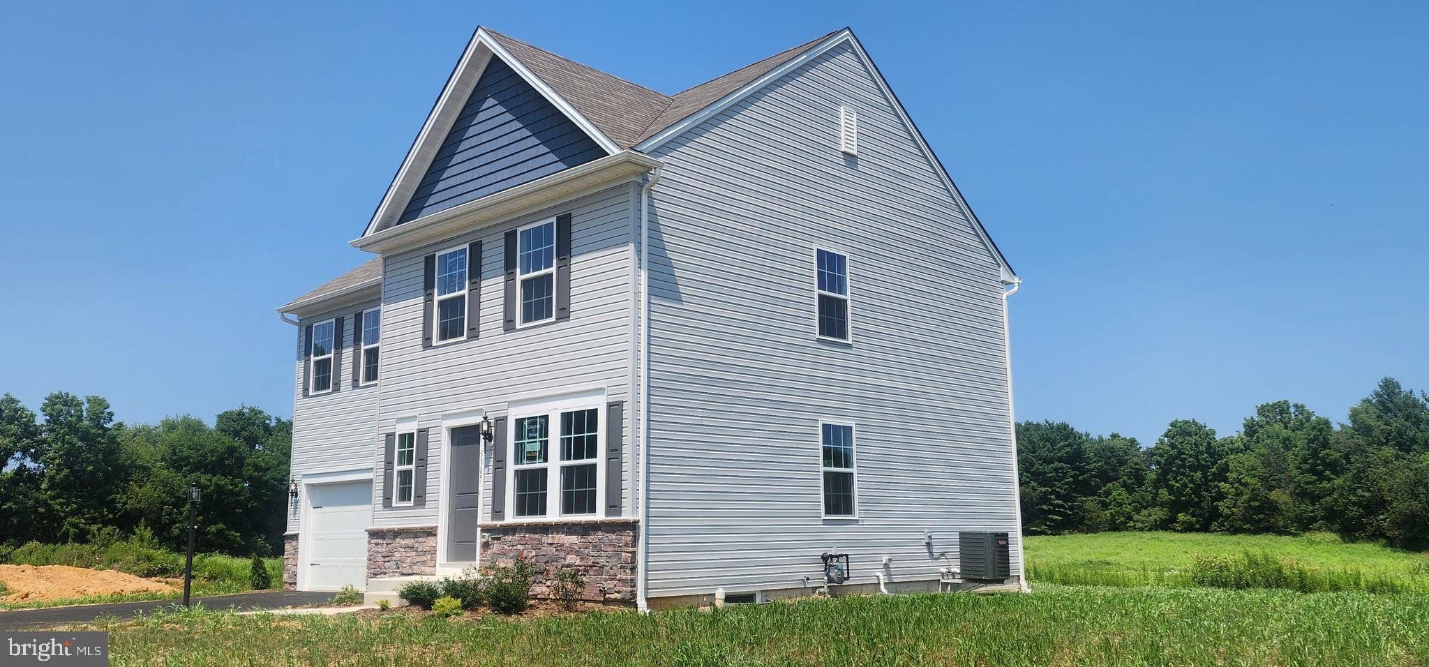 5385 Harrier Way Waynesboro, PA 17268 - Photo 6 of 23 a front view of a house with a yard